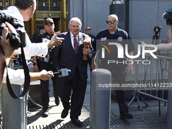 Senator Bob Menendez (D-NJ) leaves the United States District Court for the Southern District of New York after the second day of deliberati...