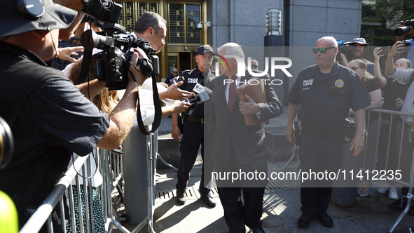 Senator Bob Menendez (D-NJ) leaves the United States District Court for the Southern District of New York after the second day of deliberati...