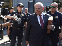 Senator Bob Menendez (D-NJ) leaves the United States District Court for the Southern District of New York after the second day of deliberati...