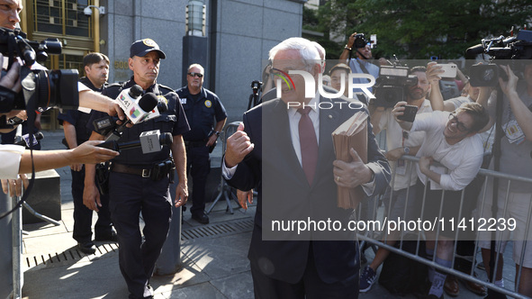 Senator Bob Menendez (D-NJ) leaves the United States District Court for the Southern District of New York after the second day of deliberati...