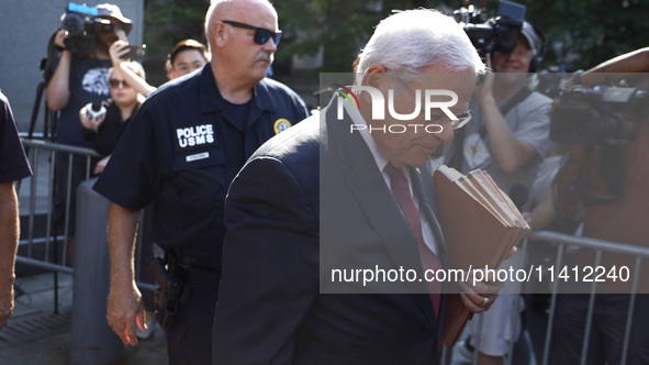 Senator Bob Menendez (D-NJ) leaves the United States District Court for the Southern District of New York after the second day of deliberati...