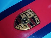 A Porsche logo is being pictured on the body of a supercar ''918 Spyder'' at the West Lake in Hangzhou, China, on July 16, 2024. (