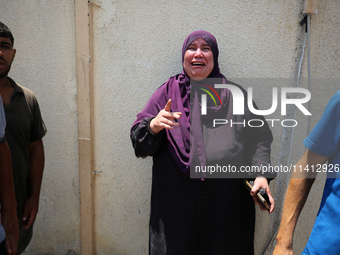 Relatives of the Palestinians, who are dying in Israeli attacks, are mourning at Al-Aqsa Martyr's Hospital in Deir al-Balah, Gaza, on July 1...