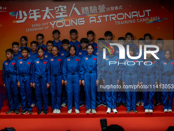 Participants of the Young Astronaut Training Camp 2024 are standing on stage during the send-off ceremony inside the Hong Kong Space Museum...