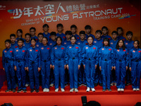 Participants of the Young Astronaut Training Camp 2024 are standing on stage during the send-off ceremony inside the Hong Kong Space Museum...