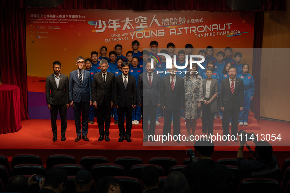 Participants of the Young Astronaut Training Camp 2024 are standing on stage during the send-off ceremony inside the Hong Kong Space Museum...