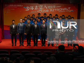 Participants of the Young Astronaut Training Camp 2024 are standing on stage during the send-off ceremony inside the Hong Kong Space Museum...