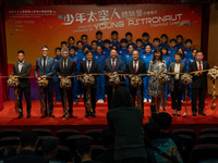 Participants of the Young Astronaut Training Camp 2024 are standing on stage during the send-off ceremony inside the Hong Kong Space Museum...