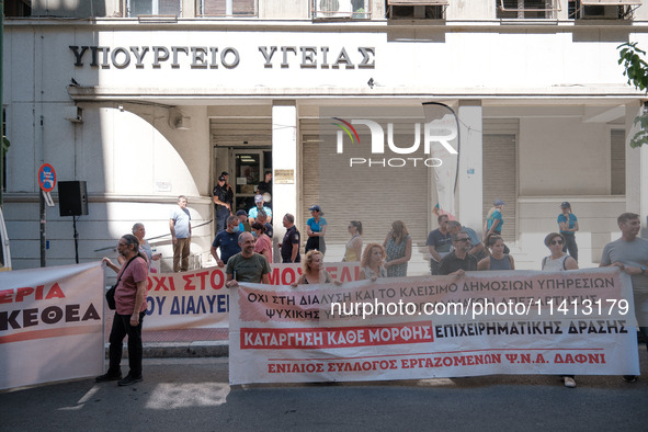 People are protesting outside the Ministry of Health in Athens, Greece, on July 16, 2024, against the new bill concerning the privatization...