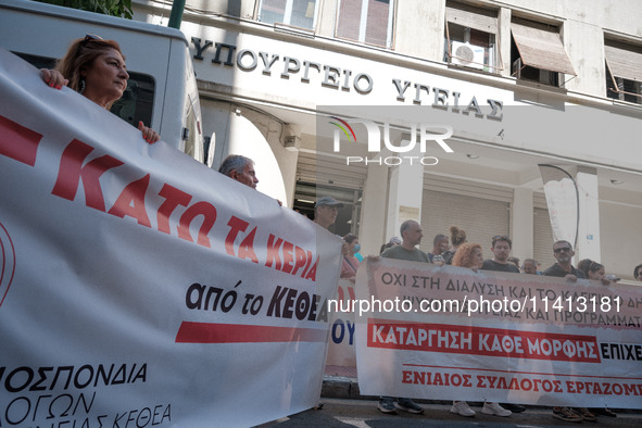 People are protesting outside the Ministry of Health in Athens, Greece, on July 16, 2024, against the new bill concerning the privatization...