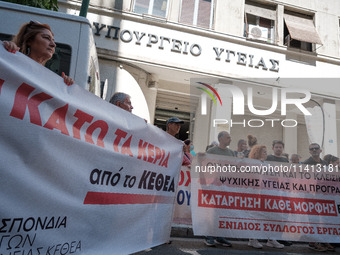 People are protesting outside the Ministry of Health in Athens, Greece, on July 16, 2024, against the new bill concerning the privatization...