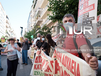 People are protesting outside the Ministry of Health in Athens, Greece, on July 16, 2024, against the new bill concerning the privatization...