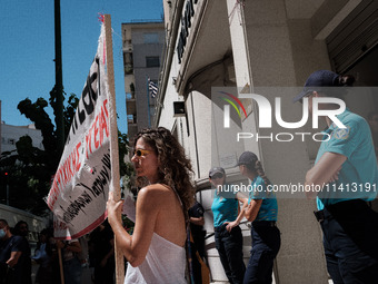 People are protesting outside the Ministry of Health in Athens, Greece, on July 16, 2024, against the new bill concerning the privatization...