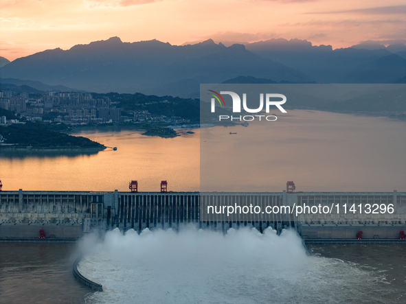 The Three Gorges Dam is opening nine holes to release water in Yichang, China, on July 16, 2024. The Three Gorges Reservoir is speeding up t...