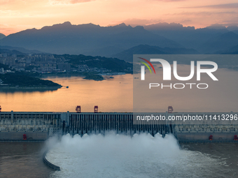 The Three Gorges Dam is opening nine holes to release water in Yichang, China, on July 16, 2024. The Three Gorges Reservoir is speeding up t...