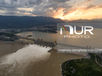 The Three Gorges Dam is opening nine holes to release water in Yichang, China, on July 16, 2024. The Three Gorges Reservoir is speeding up t...