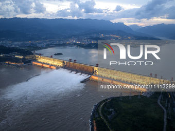 The Three Gorges Dam is opening nine holes to release water in Yichang, China, on July 16, 2024. The Three Gorges Reservoir is speeding up t...