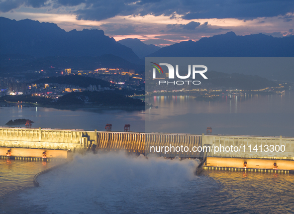 The Three Gorges Dam is opening nine holes to release water in Yichang, China, on July 16, 2024. The Three Gorges Reservoir is speeding up t...