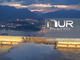 The Three Gorges Dam is opening nine holes to release water in Yichang, China, on July 16, 2024. The Three Gorges Reservoir is speeding up t...