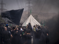 A tent that is set up in an area, serving as a symbol of the tent of Imam Hussein, is being pictured during a religious festival to commemor...