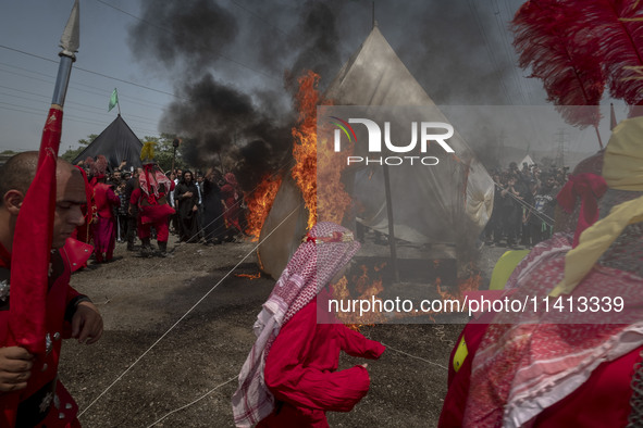 Iraqi men living in Iran are performing in a religious festival to commemorate Ashura in the Dolatabad neighborhood in southern Tehran, Iran...