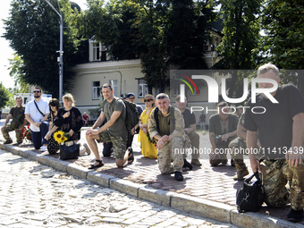 People are attending a funeral service for Mykola Kokhanivskyi, commander of the OUN (Organisation of Ukrainian Nationalists) volunteer batt...