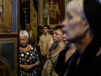 People are attending a funeral service for Mykola Kokhanivskyi, commander of the OUN (Organisation of Ukrainian Nationalists) volunteer batt...