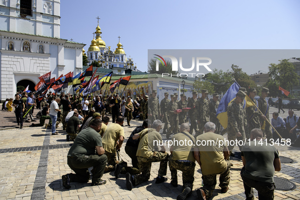 People are attending a funeral service for Mykola Kokhanivskyi, commander of the OUN (Organisation of Ukrainian Nationalists) volunteer batt...