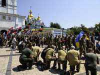 People are attending a funeral service for Mykola Kokhanivskyi, commander of the OUN (Organisation of Ukrainian Nationalists) volunteer batt...