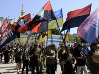 People are attending a funeral service for Mykola Kokhanivskyi, commander of the OUN (Organisation of Ukrainian Nationalists) volunteer batt...