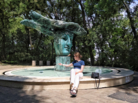 A woman is standing at the Beginning of Beginnings fountain in Greek Park on Prymorskyi Boulevard in Odesa, Ukraine, on July 13, 2024. NO US...