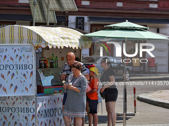 People are buying ice cream on a hot summer day in Odesa, Ukraine, on July 13, 2024. NO USE RUSSIA. NO USE BELARUS. (