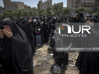 Iraqi women living in Iran are beating themselves while participating in a religious festival to commemorate Ashura, in Dolatabad neighborho...