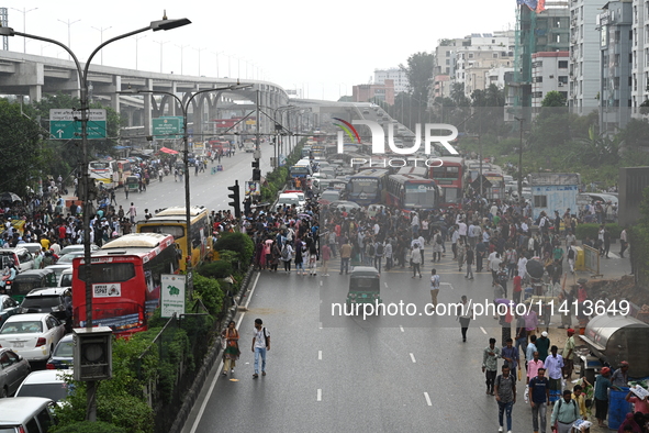 Anti-quota protesters are shouting slogans during a road-block demonstration at Banani in Dhaka, Bangladesh, on July 16, 2024. At least six...