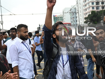 Anti-quota protesters are shouting slogans during a road-block demonstration at Banani in Dhaka, Bangladesh, on July 16, 2024. At least six...