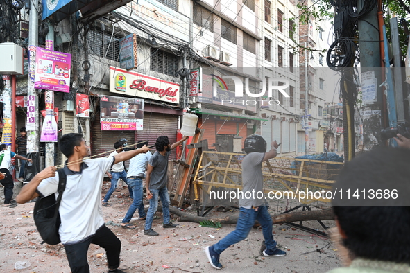 Anti-quota Protesters And Students Backing The Ruling Awami League Party Clash In Dhaka, Bangladesh, On July 16, 2024. At Least Six Demonstr...