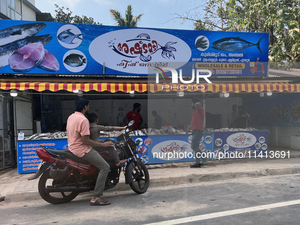 Fish are standing along the roadside in Punalur, Kerala, India, on April 04, 2024. 