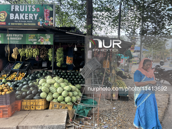 A fruit stand is operating in Punalur, Kerala, India, on April 04, 2024. 