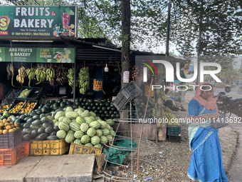 A fruit stand is operating in Punalur, Kerala, India, on April 04, 2024. (