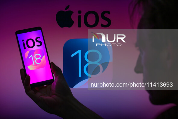 The Apple iOS 18 is being displayed on a smartphone with Apple iOS 18 visible in the background, in this photo illustration in Brussels, Bel...