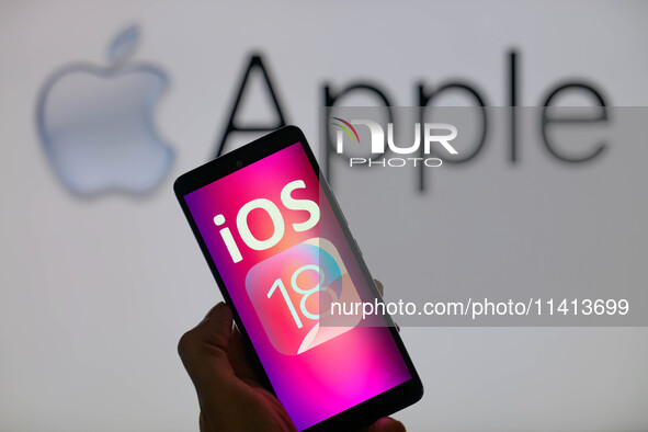 The Apple iOS 18 is being displayed on a smartphone with Apple visible in the background, in this photo illustration in Brussels, Belgium, o...