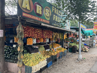 A fruit stand is operating in Punalur, Kerala, India, on April 04, 2024. (