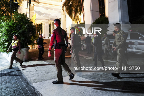 Police are gathering outside the Grand Hyatt Erawan Hotel in Bangkok, Thailand, on July 16, 2024. Local news reports are saying that at leas...