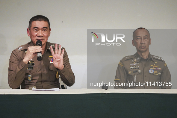 Metropolitan Police Bureau Commissioner Thiti Sangsawang is speaking as National Police Chief Torsak Sukvimol is looking on during a press c...