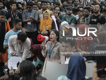 Anti-quota protestors are blocking the road following the death of fellow protesters during a clash with the pro-government student wing in...