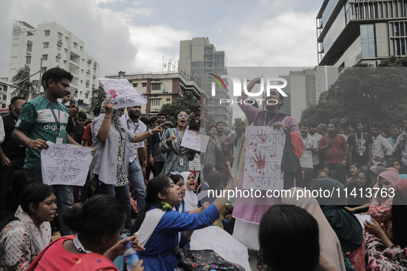 Anti-quota protestors are blocking the road following the death of fellow protesters during a clash with the pro-government student wing in...