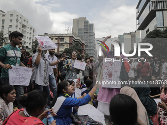 Anti-quota protestors are blocking the road following the death of fellow protesters during a clash with the pro-government student wing in...