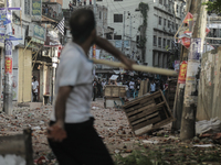 Pro-government student wing and anti-quota protestors are clashing in Dhaka, Bangladesh, on July 16, 2024. (