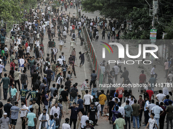 Pro-government student wing and anti-quota protestors are clashing in Dhaka, Bangladesh, on July 16, 2024. (