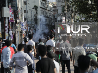 Pro-government student wing and anti-quota protestors are clashing in Dhaka, Bangladesh, on July 16, 2024. (